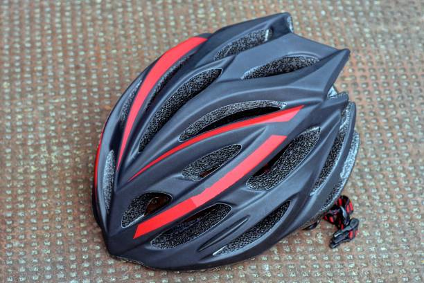 istock one large black plastic bicycle helmet with red stripes 1316668492