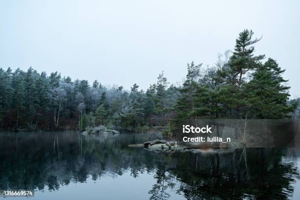 Winter Season In Scandinavia Landscape With Lake Rocks And Trees Horizontal Stock Photo - Download Image Now
