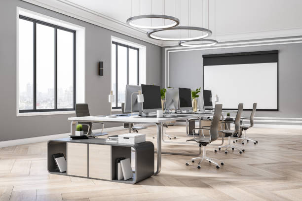 istock Stylish classic open space office with white wall board, parquet, light grey walls and city view from big window 1316669625