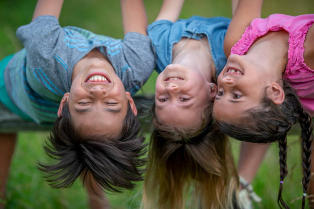 istock Smiling children in nature 1316669775