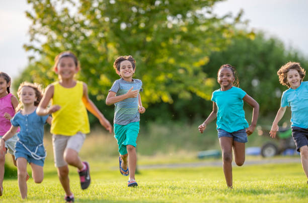 istock Joyful children running in nature 1316669797