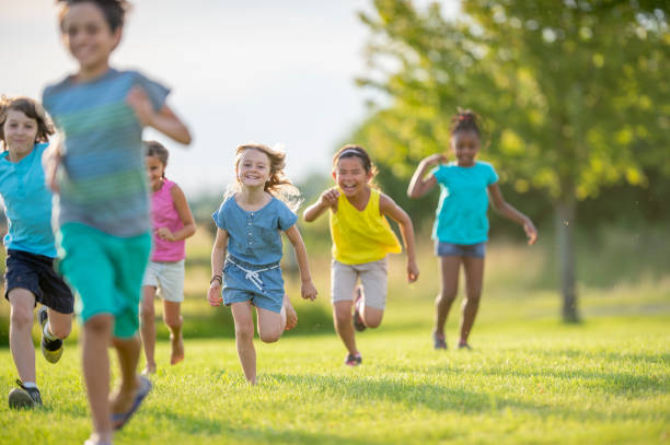 istock Joyful children running in nature 1316669799