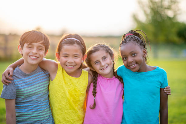 istock Smiling children in nature 1316669816