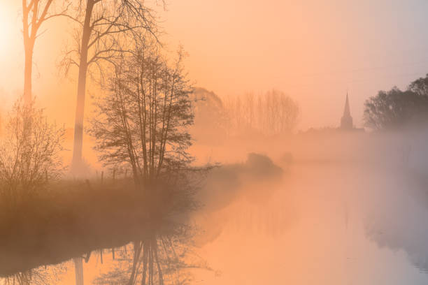istock Church tower in the morning light whit mist 1316671336