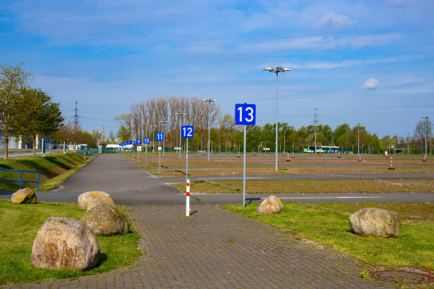 istock Large empty car park. Row numbering on blue plates. 1316672308