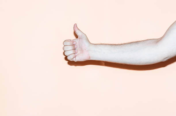 istock Hand gesture on orange background. Good gesture 1316672409