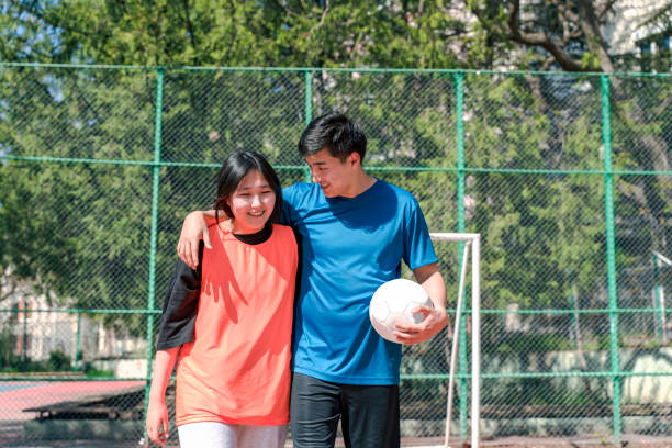 istock Friends going home by chatting after a good soccer game 1316672649