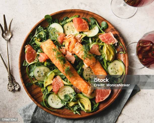 Salmon Over Watercress Salad Stock Photo - Download Image Now - Salmon - Seafood, Salad, Food