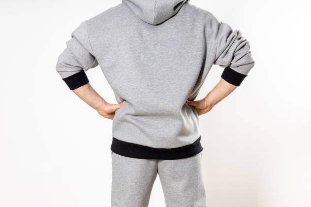 istock man in a gray tracksuit on a white background 1316675958