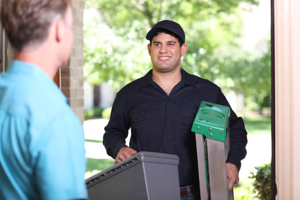 istock Latin descent repairman, technician makes house call at customer home. 1316679121