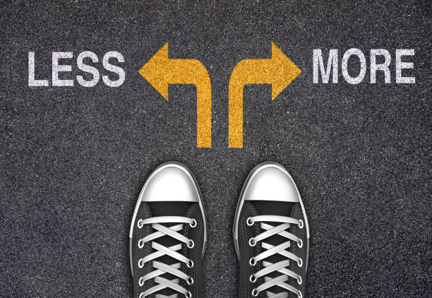 istock Decision at a crossroad - Less or More 1316679570