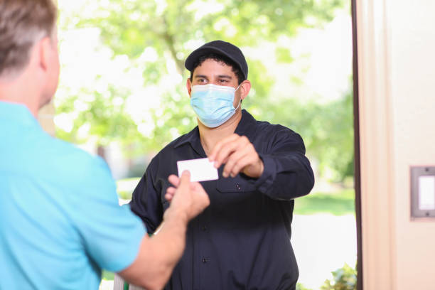 istock Latin descent repairman, technician makes house call at customer home. 1316679616