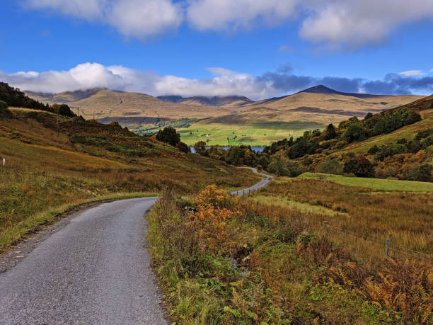istock Winding road winding it's way to distant hills 1316680317