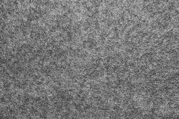 textura de fieltro monocromo gris - fieltro fotografías e imágenes de stock