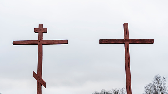 Orthodox and Catholic crosses side by side. The concept of unity of faith.