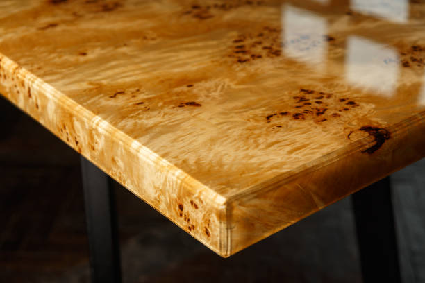table top for a table made of poplar burl wood and transparent epoxy resin. - tree resin imagens e fotografias de stock