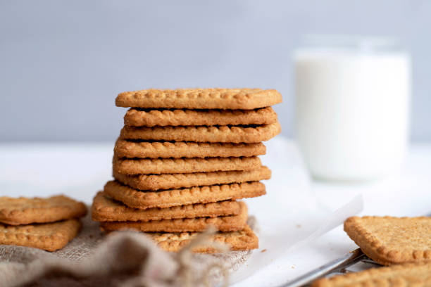istock Biscuits with milk on wood background in the morning 1316685295