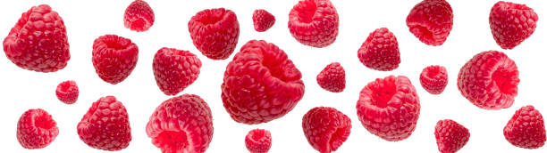 istock Red, ripe raspberries on a white background. Ripe berries, levitation. 1316685361