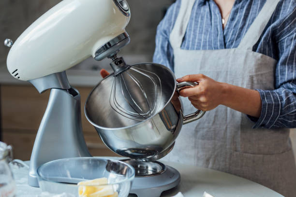 istock Unrecognizable Woman Using a Stand Mixer in the Kitchen 1316690041