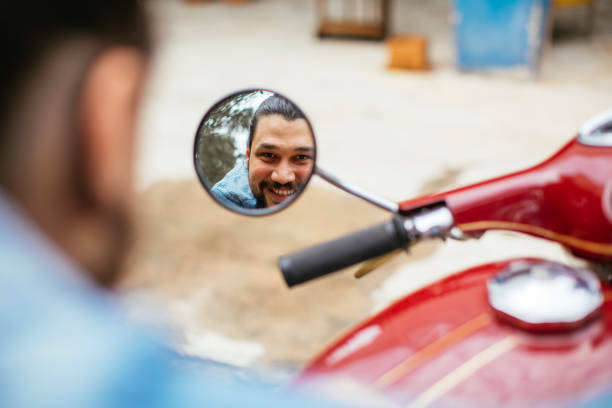 istock Handsome man sitting on old classic motorcyle 1316690716