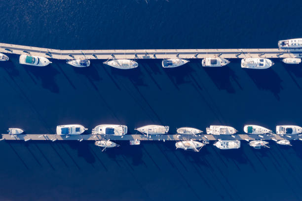 Aerial View of Marina at Fernandina Beach, Florida Boats moored at the marina on the Amelia River near Jacksonville, Florida. jetty aerial stock pictures, royalty-free photos & images