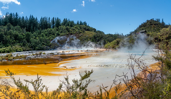 Tourists are enjoying the view of Orakei Korako Geothermal Park in Taupo, New Zealand.