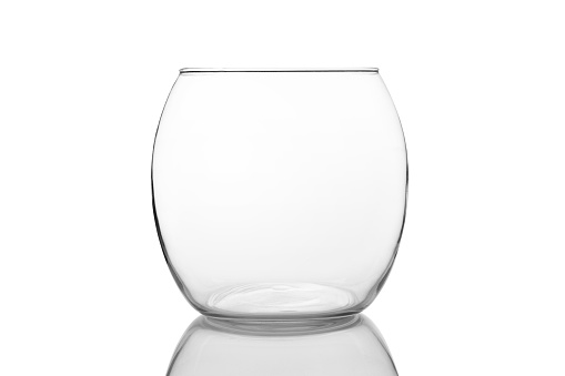 Empty glass bowl isolated on white