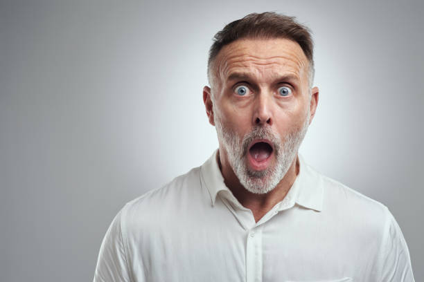 istock Studio portrait of a mature man looking surprised against a grey background 1316702245
