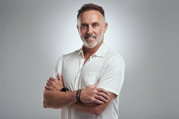 istock Studio shot of a mature man looking thoughtful against a grey background 1316702258