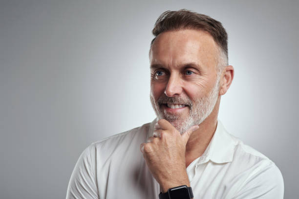istock Studio shot of a mature man looking thoughtful against a grey background 1316702395