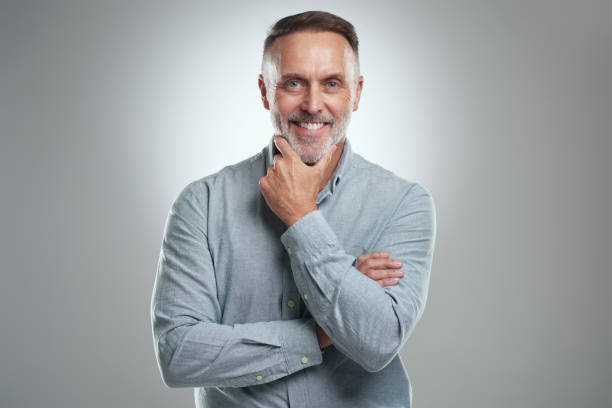 istock Studio portrait of a mature man looking thoughtful against a grey background 1316703165