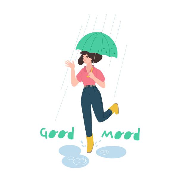 istock Happy young woman with an umbrella jumping under the rain 1316704117