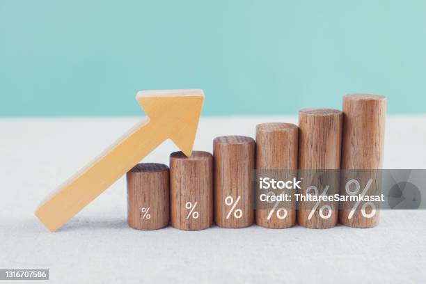 Wooden Blocks With Percentage Sign And Arrow Up Financial Growth Interest Rate And Mortgage Rate Increase Inflation Concept Stock Photo - Download Image Now