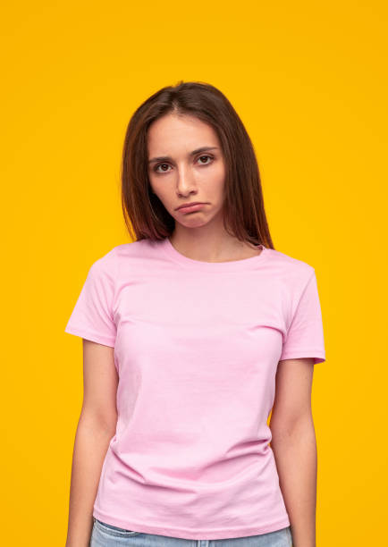 istock Upset young woman frowning at camera 1316709686