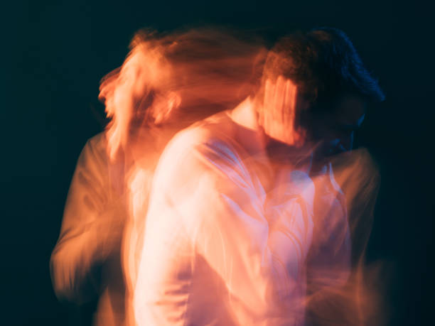 rage man bipolar disorder psychology stress Rage man. Bipolar disorder. Psychology stress. Toxic relationship. Conceptual art portrait. Surreal aggressive screaming guy reflecting each other isolated green blur light double exposure. schizophrenia stock pictures, royalty-free photos & images