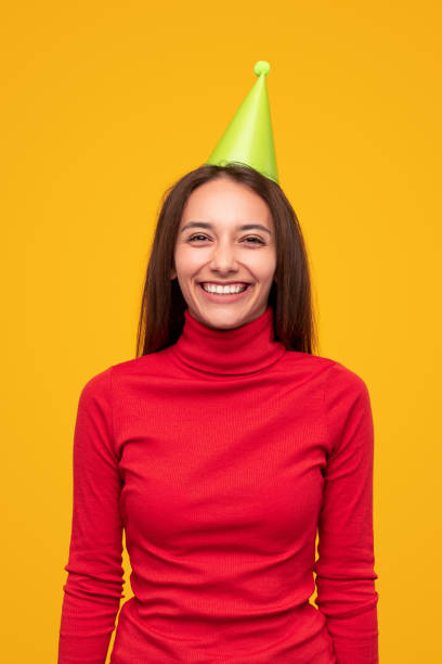 istock Cheerful woman in party hat 1316718554