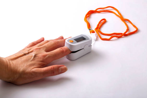 istock Male hand while measuring pulse oximeter heart rate and oxygen saturation 1316720324