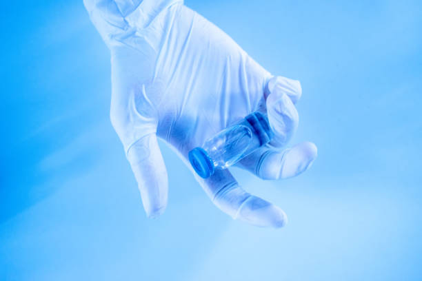 istock Close-up hand and medical reagents 1316723099