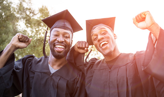 College and high school Graduation. Student cap, mortarboard hat black with gold tassel, blur background. 3d render