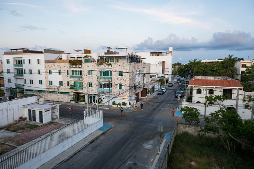 Playa del Carmen, Mexico - May 6, 2021: High angle view of an intersection at sunset in Playa del Carmen, a popular tourist destination in Mexico's Quintana Roo state.