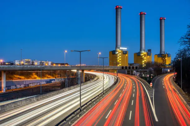 Photo of Highway and  power station at night