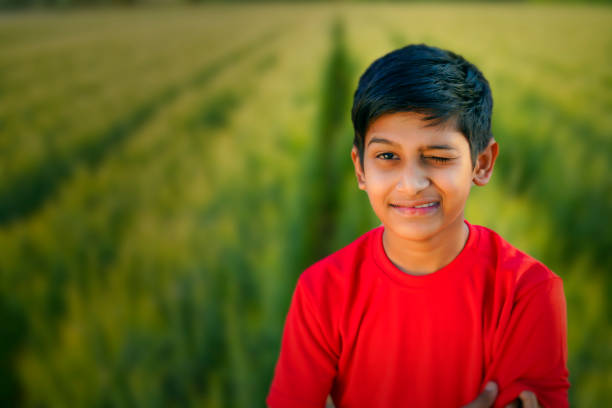 young indian child wink his eye