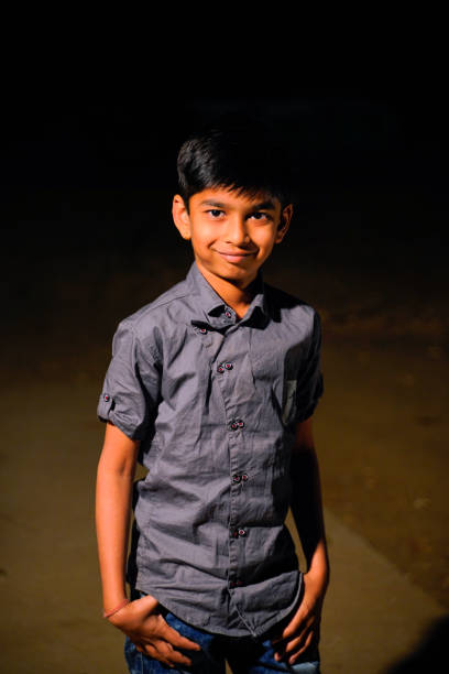 istock cute indian little child standing on road 1316728322