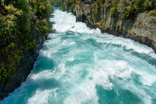 A fast river near Pop's View lookout. Fiordland national park. South island, New Zealand