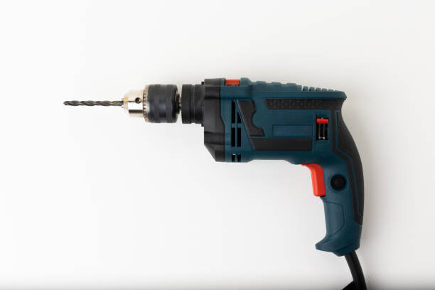 istock Electric drill on the isolated whited white background. 1316731117