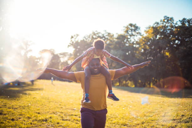 istock African American father and son in nature. 1316731482