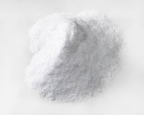 istock handful of dextrose crystalline sugar on white 1316731750