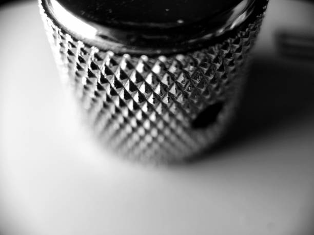 istock Grey Scale Macro of Bass Volume Knob 1316734334
