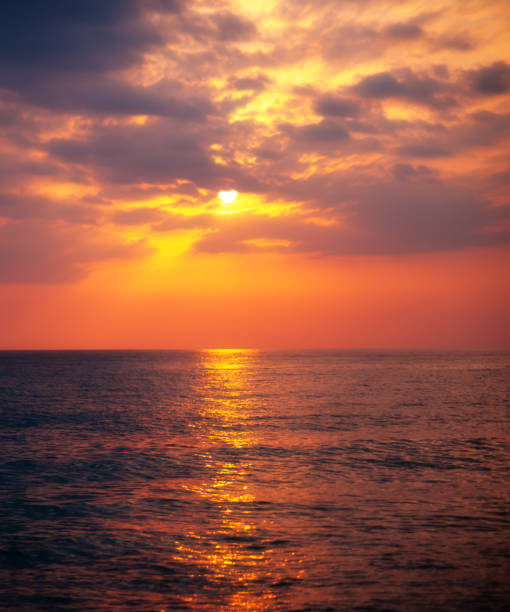 istock Colorful sunset over the sea with clouds. Natural background 1316735441