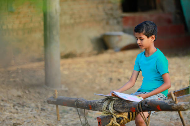 istock Cute indian child studying at home 1316738038